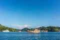 Sailing boats moored along the shore in a sunny day of summer in Indonesia Royalty Free Stock Photo