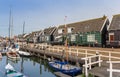 Sailing boats in the old harbor of Marken