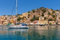 Sailing boats in port of Symi island, Greece