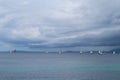 Sailing boats race on sea on a cloudy day Royalty Free Stock Photo