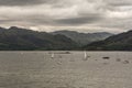 Sailing boats and sloops on Loch Carron, Scotland. Royalty Free Stock Photo