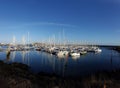 Sailing boats in a small port