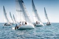 Sailing boats on the start line of regatta