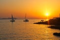 sailing boats at sunset in the sea