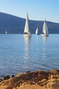 Sailing boats on water. Beautiful winter Mediterranean landscape. Montenegro, Bay of Kotor Royalty Free Stock Photo