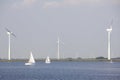Sailing boats and wind turbines Royalty Free Stock Photo