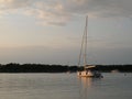 Sailing boats and yachts are floating on a peaceful surface of theAdriatic Sea,Croatia,Europe. In the background the coast with Me