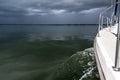 Sailing concept with boat and lake water storm weather Royalty Free Stock Photo