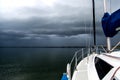 Sailing concept with boat and lake water storm weather Royalty Free Stock Photo