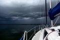 Sailing concept with boat and lake water storm weather Royalty Free Stock Photo