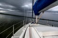 Sailing concept with boat and lake water storm weather Royalty Free Stock Photo