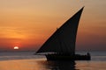 Sailing in a dhow during sunset in a tropical Island Royalty Free Stock Photo