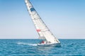 Sailing keelboat yacht with white sails Royalty Free Stock Photo