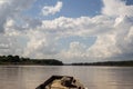 Sailing the mekong river in an old boat, beautiful scenery of the asian river. Travel concept, adventure traveler