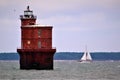 Sailing past a Chesapeake Bay Light House Royalty Free Stock Photo