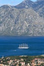Sailing ship on the background of mountains. Montenegro Royalty Free Stock Photo