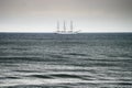 Sailing ship on the Baltic sea. Three-masted full-rigged frigate ship Dar Mlodziezy on the high seas.