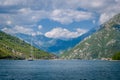 Sailing ship in the Bay of Kotor mountains Royalty Free Stock Photo