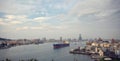 A sailing ship and city view at Kaohsiung harbor (Gao Xiong, Taiwan) Royalty Free Stock Photo