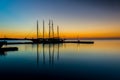 Ship and Pier at Sunrise on the York River in Yorktown, Virginia Royalty Free Stock Photo