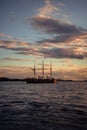 Sailing ship in the harbor at sunset. Royalty Free Stock Photo