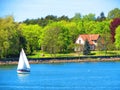 Sailing ship and home , Lithuania Royalty Free Stock Photo