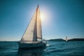 Sailing ship luxury yacht with white sails in the Sea. Sport. Royalty Free Stock Photo