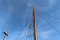 Sailing ship mast against the blue sky on some sailing boats with rigging details Royalty Free Stock Photo