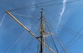 Sailing ship mast against the blue sky on some sailing boats with rigging details Royalty Free Stock Photo