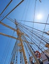 Sailing, ship and mast outdoor with rope for travel, journey and low angle of blue sky in summer. Boat, wood pole and Royalty Free Stock Photo