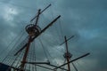 Sailing ship masts against stormy sky Royalty Free Stock Photo