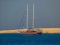 A sailing ship moored in the sheltered waters of Tiran island in the Red Sea near Sharm El Sheik, Egypt Royalty Free Stock Photo