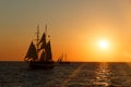 Sailing ship silhouette in sunset on the sea Royalty Free Stock Photo