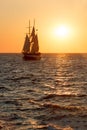 Sailing ship silhouette in sunset on the sea Royalty Free Stock Photo