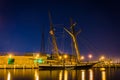 Sailing ship on the waterfront in Fells Point at night, Baltimore, Maryland.