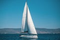 Sailing ship yacht with white sails in the Aegean Sea. Royalty Free Stock Photo