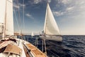 Sailing ship yachts with white sails