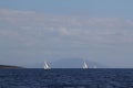 Sailing ship yachts with white sails in race the regatta in the open sea Royalty Free Stock Photo