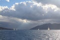 Sailing ship yachts with white sails in race the regatta in the open sea