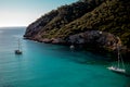 Sailing ships in the bay of Cala Llonga Royalty Free Stock Photo