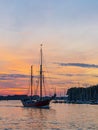 Sailing ships on the river Warnow in the sunset during the Hanse Sail in Rostock, Germany