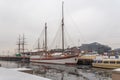 Sailing ships in winter berth in the port of Oslo Royalty Free Stock Photo