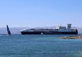 Sailing vs Ulusoy Sealines Ship  by the Cesme Port Royalty Free Stock Photo