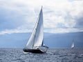 Sailing in the wind through the waves at the Aegean Sea in Greece. Luxury. Royalty Free Stock Photo