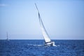 Sailing in the wind through the waves at the Aegean Sea in Greece. Royalty Free Stock Photo