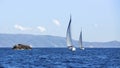 Sailing in the wind through the waves at the Aegean Sea in Greece. Royalty Free Stock Photo