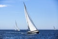 Sailing in the wind through the waves at the Aegean Sea in Greece. Royalty Free Stock Photo