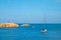 Sailing yacht in the blue sea. Ship yacht sails in the open Sea. Luxury boats. Crete, Greece. Aegean sea.