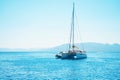 Sailing yacht catamaran boat in the sea in Greece, turquoise waters of Aegean Sea near Athens. Royalty Free Stock Photo
