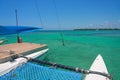 Sailing yacht catamaran sails on the waves in the warm Caribbean Sea. Sailboat. Sailing. Cancun Mexico. Summer sunny day Royalty Free Stock Photo